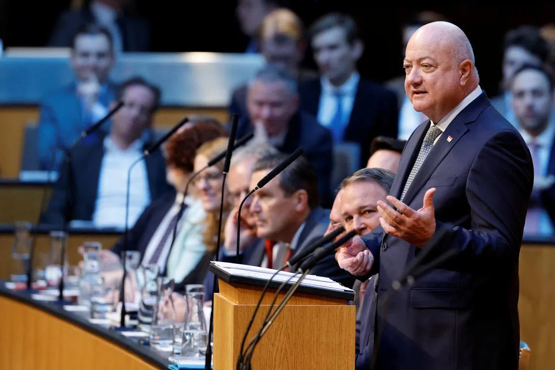 FILE PHOTO: Austrian Chancellor Christian Stocker addresses a session of the parliament in Vienna, Austria, March 7, 2025. REUTERS/Leonhard Foeger/File Photo