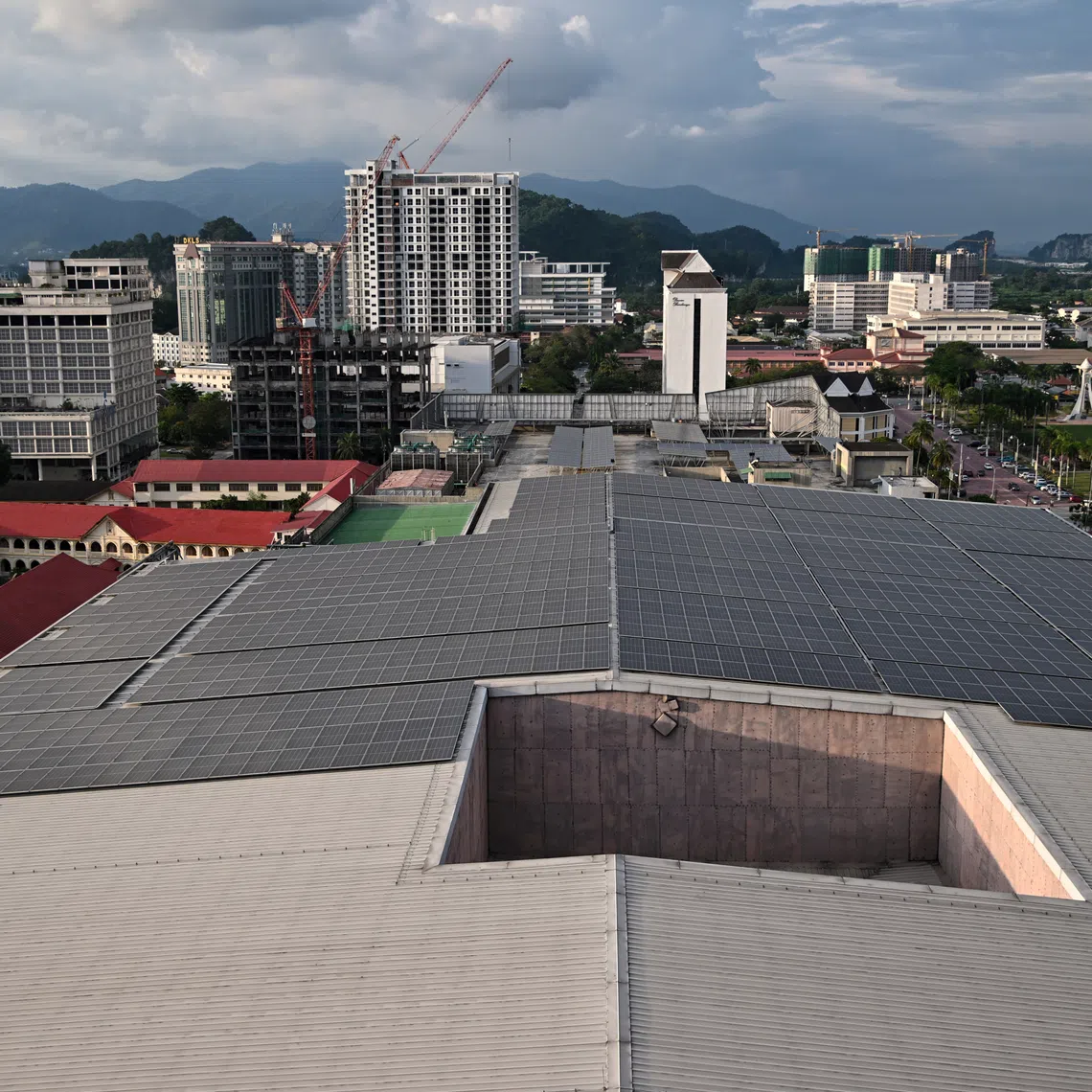 Solar panels in Ipoh. Malaysia’s renewed National Energy Efficiency Action Plan aims to reduce energy demand by 11.6 per cent.