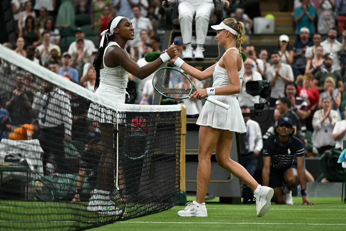 Coco Gauff of the US (left) congratulates Ukraine's Dayana Yastremska on winning their first-round match.