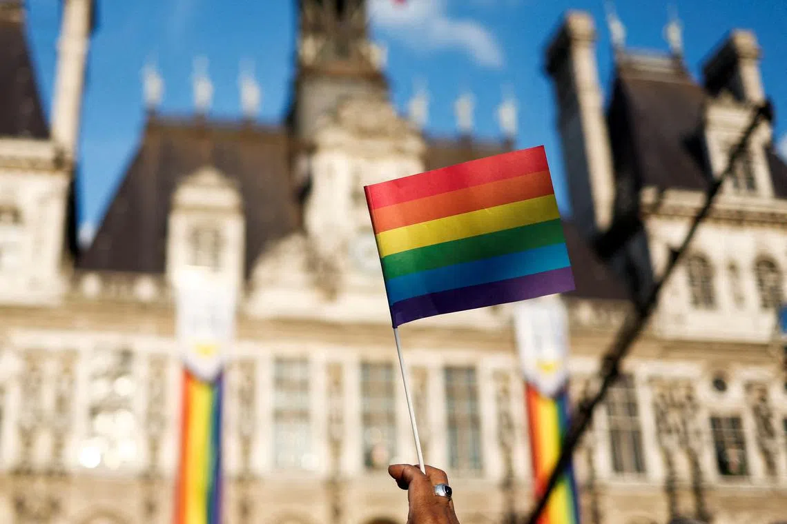 FILE PHOTO: A pride flag is pictured during the 10th anniversary of the enactment of same-sex marriage in France (also known as \"Mariage pour Tous\") at Paris City Hall, France, May 17, 2023. REUTERS/Benoit Tessier/File Photo