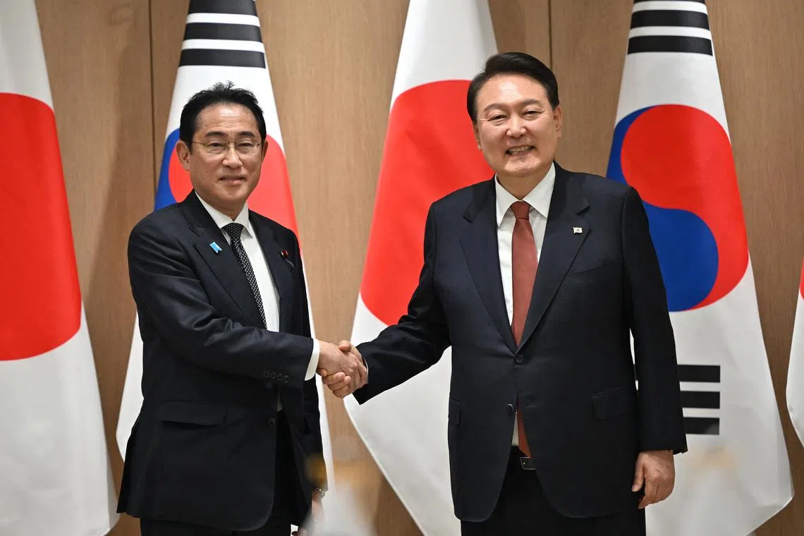 Japanese Prime Minister Fumio Kishida (left) meets South Korean President Yoon Suk-yeol in Seoul, on May 7, 2023.