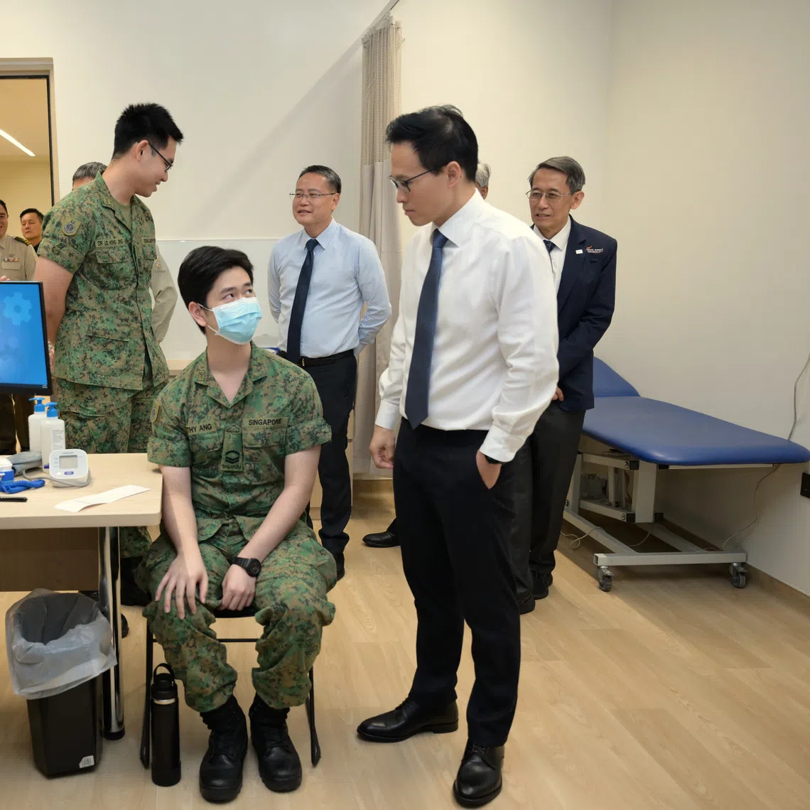 Minister of State for Defence Desmond Choo (right) on a tour of CMPB medical facilities on Oct 24.