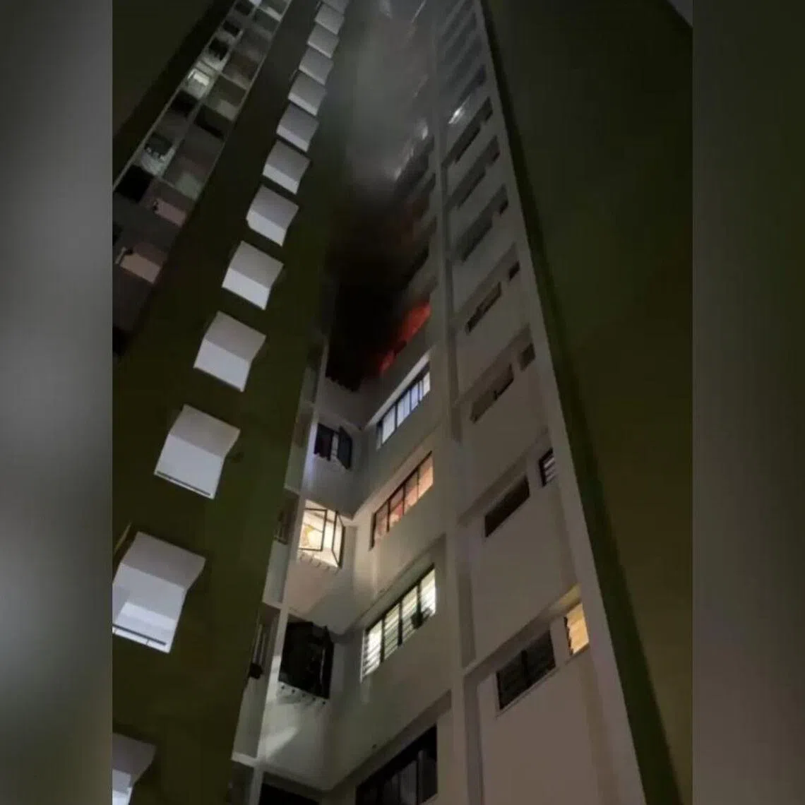 In a video a reader shared with The Straits Times, a seventh floor flat in Braddell Hill appears to be engulfed in flames.