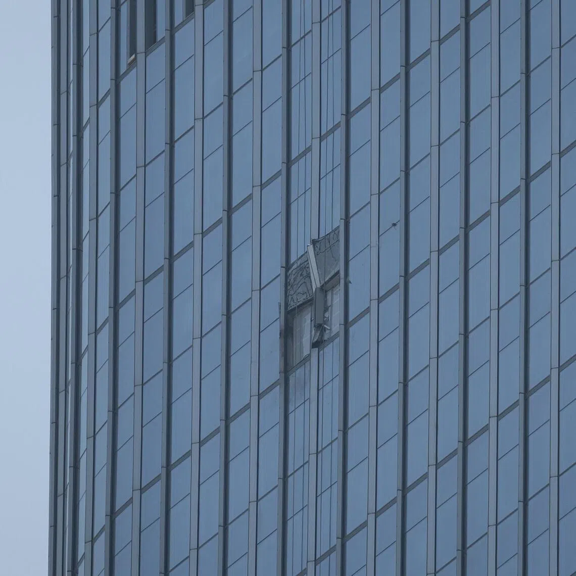 Damage on the facade of Citic Tower in Beijing on June 27.