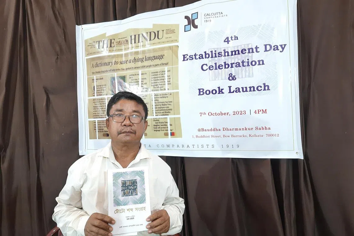ddtoto - Mr Bhakta Toto, with the Toto language dictionary that he has compiled. It was released in Kolkata on Oct 7.

Credit: Debarshi Dasgupta