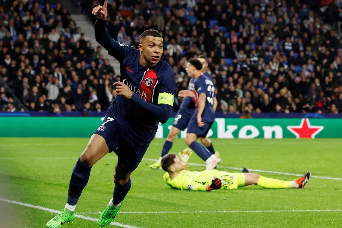 Paris Saint-Germain's Kylian Mbappe celebrates after scoring his second goal in the 2-1 Champions League win over Real Sociedad.    