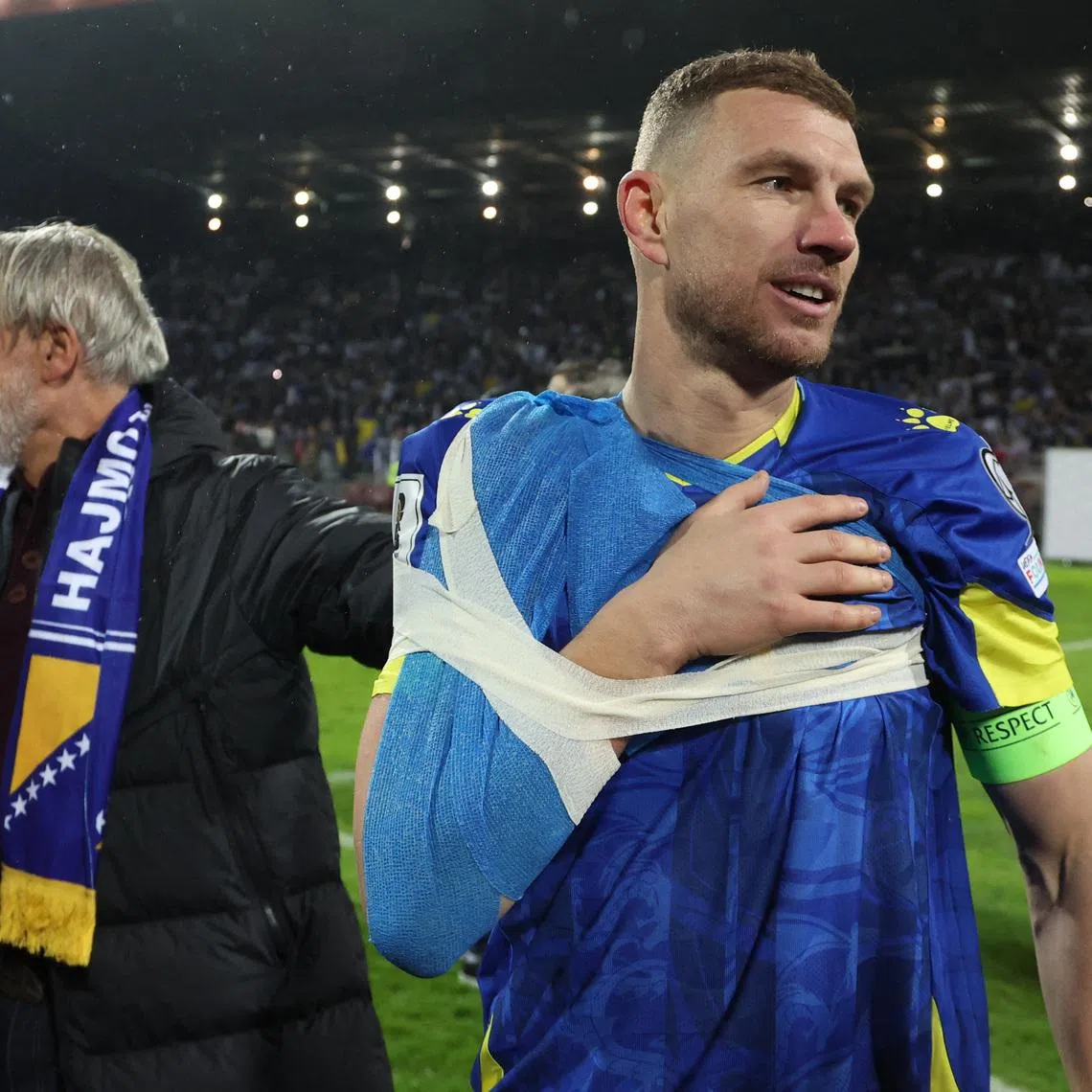 Soccer Football - FIFA World Cup - UEFA Qualifiers - Finals - Bosnia and Herzegovina v Italy - Bilino Polje Stadium, Zenica, Bosnia and Herzegovina - March 31, 2026 Bosnia and Herzegovina's Edin Dzeko celebrates qualifying for the FIFA World Cup REUTERS/Amel Emric