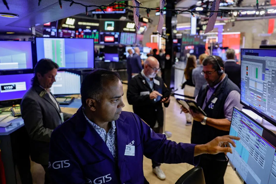S&P 500 hits record high as soft jobs report eases rate hike concerns