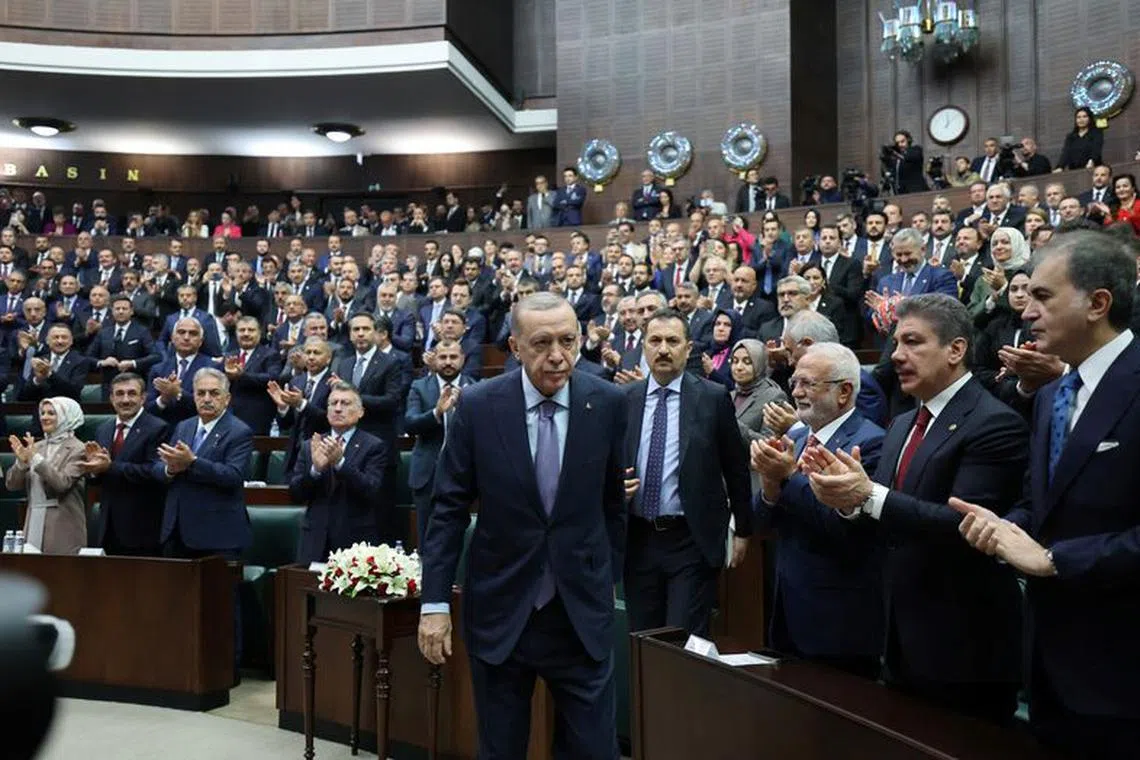 Turkish President Tayyip Erdogan attends a meeting with members of parliament from his ruling AK Party (AKP) at the Turkish parliament in Ankara, Turkey, October 25, 2023. Murat Cetinmuhurdar/PPO/Handout via REUTERS THIS IMAGE HAS BEEN SUPPLIED BY A THIRD PARTY. NO RESALES. NO ARCHIVES