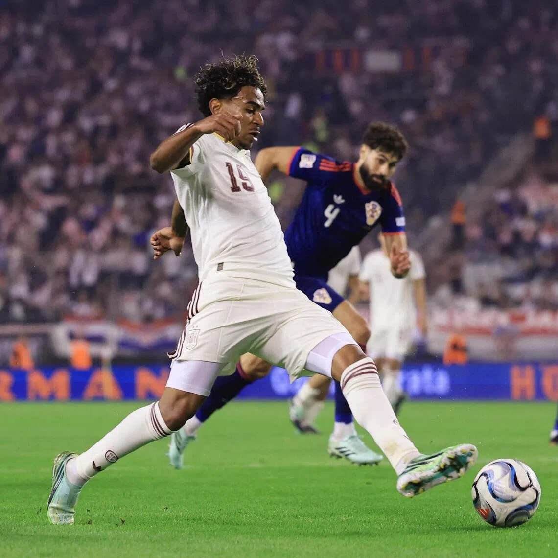 Spain’s Lamine Yamal in action (left) with Croatia’s Josko Gvardiol on Oct 6.