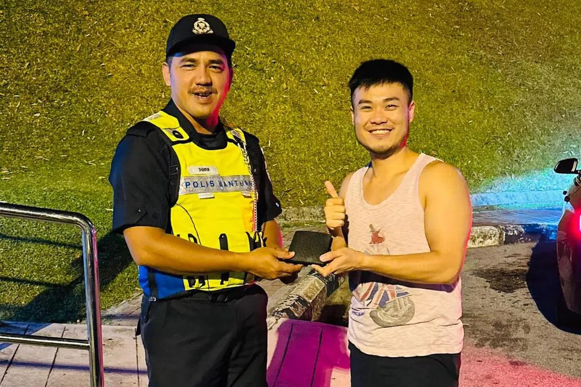 Mr Kendrick Kang donated the cash inside his wallet to cap off an eventful day on the road.