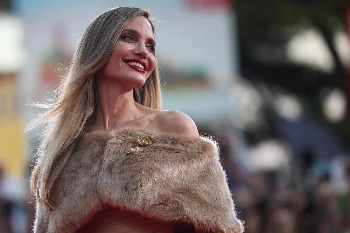 Angelina Jolie poses on the red carpet during arrivals for the screening of the movie Maria, in competition, at the 81st Venice Film Festival, Venice, Italy, on Aug 29.