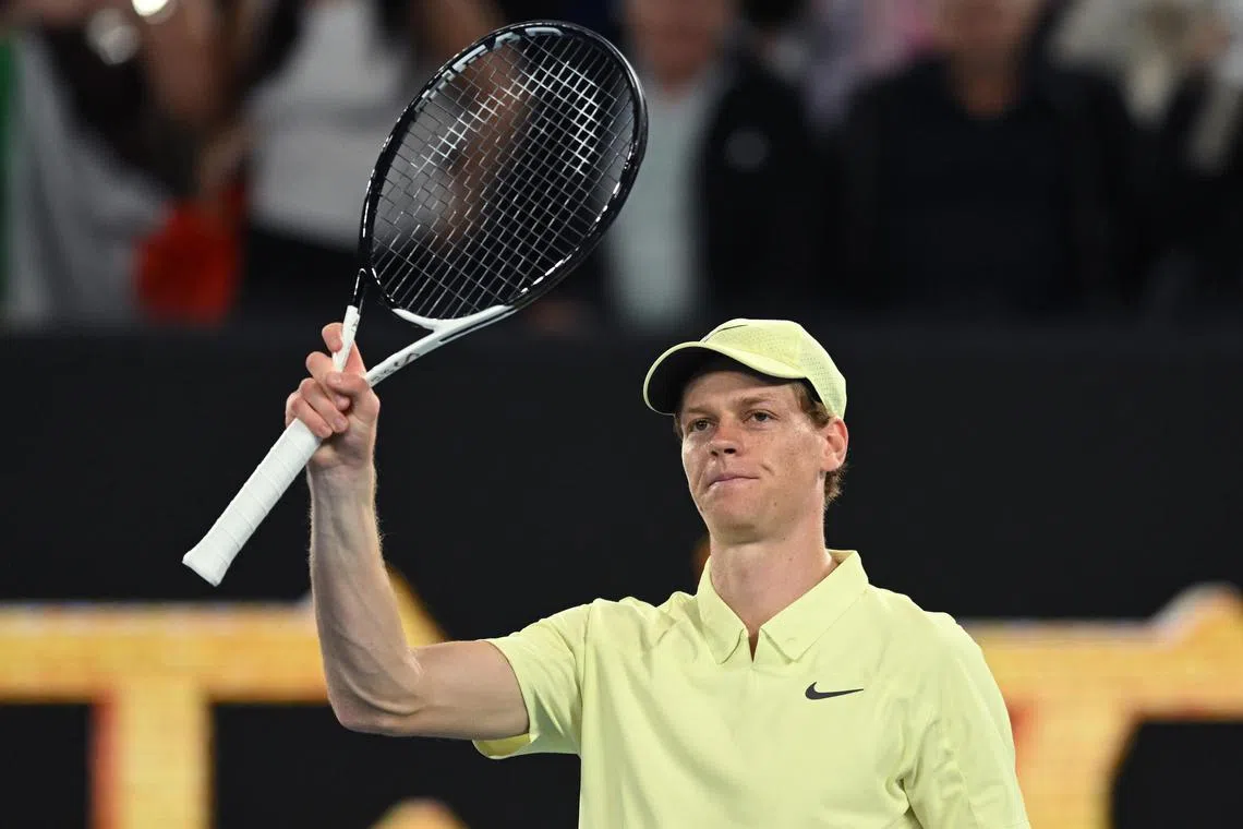 Jannik Sinner celebrates winning his match against Tristan Schoolkate at the Australian Open.