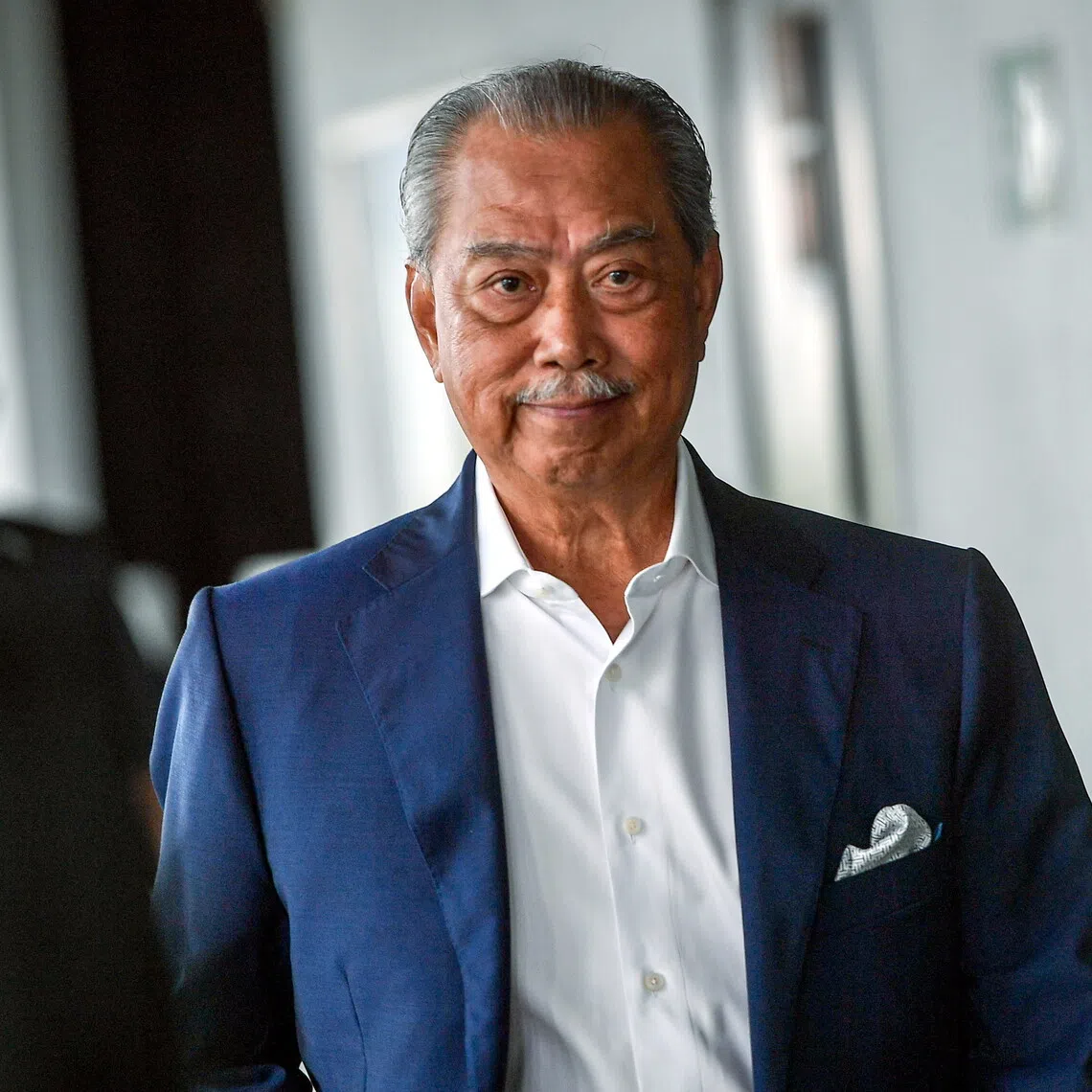 Former prime minister Muhyiddin Yassin was charged with four counts of using his position to obtain bribes totalling RM232.5 million (S$72.6 million).