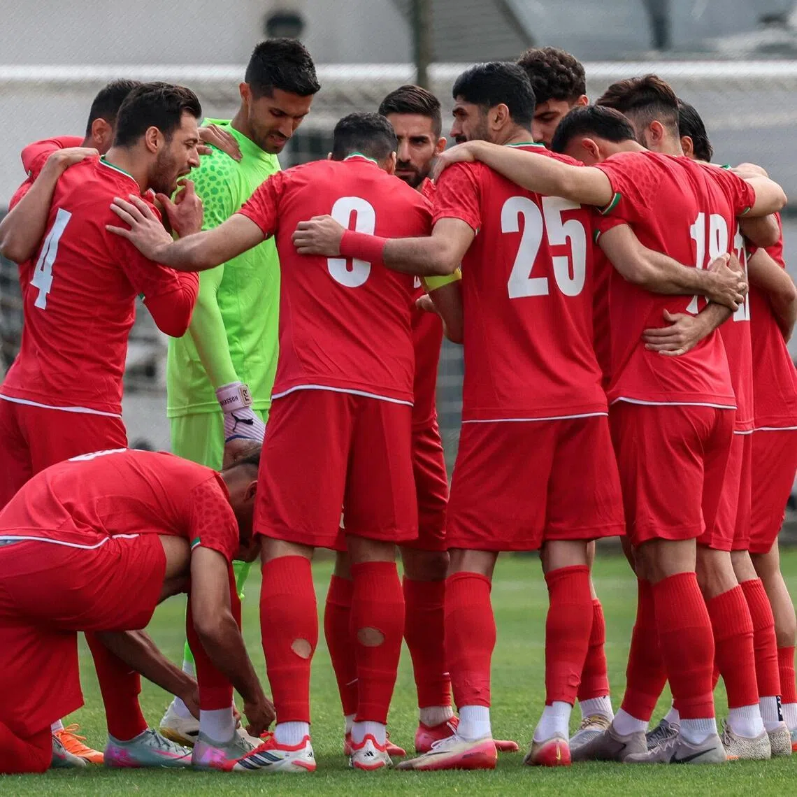 Iran's players gather on the pitch before a 5-0 friendly win over Costa Rica in Antalya, southern Turkey, on March 31, 2026.