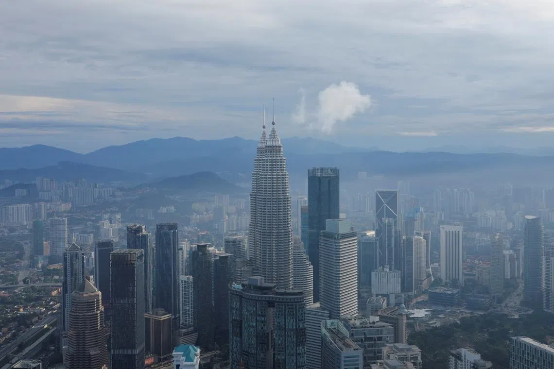 FILE PHOTO: A general view of city skyline including Malaysia's landmark Petronas Twin Towers in Kuala Lumpur, Malaysia February 3, 2023. REUTERS/Hasnoor Hussain/ FILE PHOTO
