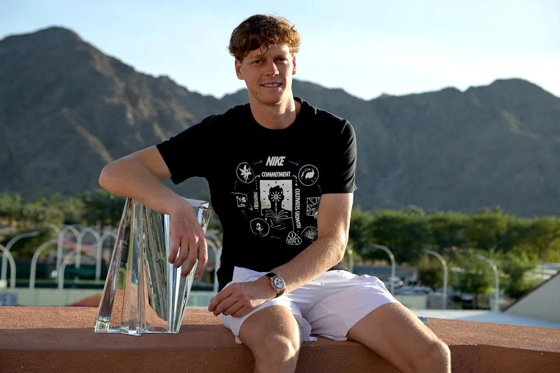 Mar 15, 2026; Indian Wells, CA, USA;  Jannik Sinner (ITA) with the championship trophy after he defeated Daniil Medvedev (RUS) in the menÕs final of the BNP Paribas Open at the Indian Wells Tennis Garden. Mandatory Credit: Jayne Kamin-Oncea-Imagn Images