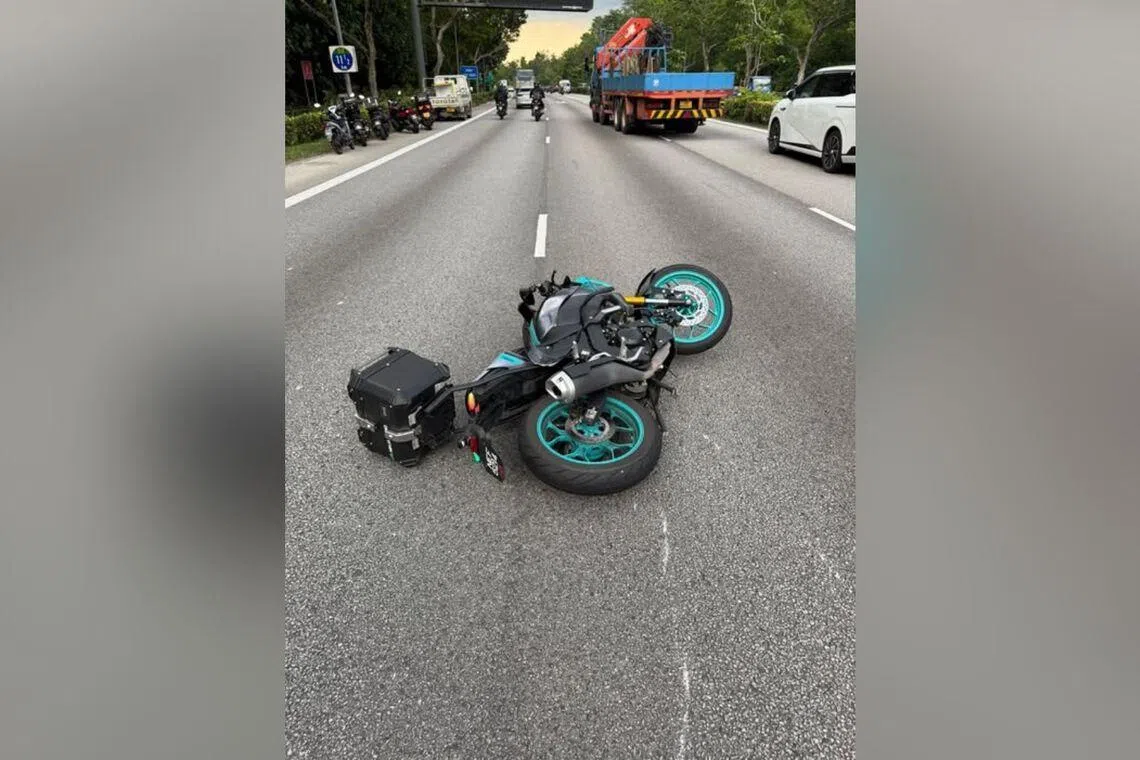 Scratch marks can be seen near the toppled motorcycle.