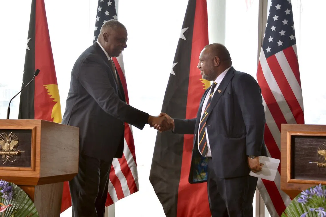 Papua New Guinea’s PM James Marape (right) with US Defence Secretary Lloyd Austin in Port Moresby, on July 27.