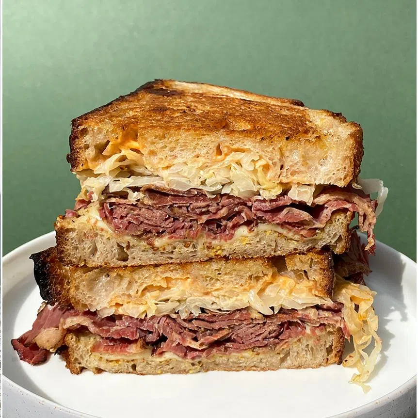 Park Bench Deli will be serving up its signature sandwiches - the Hot Fried Chicken (left) and the Pastrami Reuben.