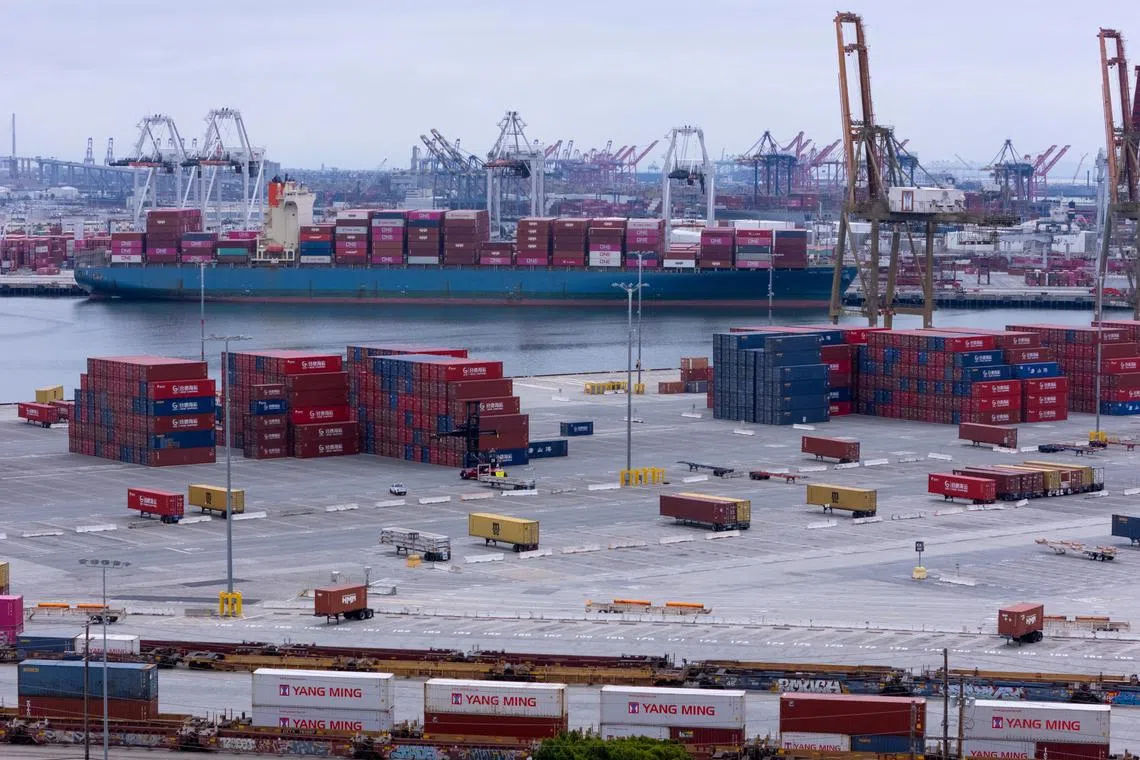 FILE PHOTO: A drone view shows shipping containers from China at the Port of Los Angeles, in San Pedro, California, U.S., May 1, 2025. REUTERS/Mike Blake/File Photo