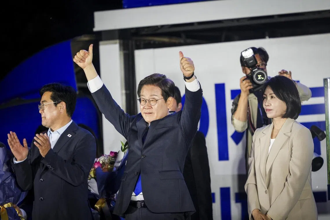 Mr Lee Jae-myung, the new president of South Korea, with his wife Kim Hye-kyung, at an election night rally in Seoul, South Korea, on June 4, 2025.