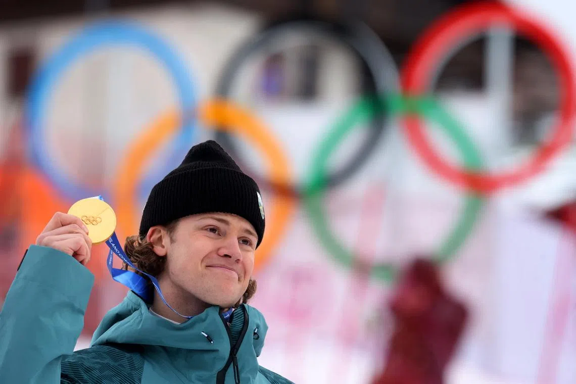 Milano Cortina 2026 Olympics - Alpine Skiing - Men's Giant Slalom Victory Ceremony - Stelvio Ski Centre, Bormio, Italy - February 14, 2026. Gold medallist Lucas Pinheiro Braathen of Brazil celebrates on the podium during the men's giant slalom victory ceremony REUTERS/Denis Balibouse