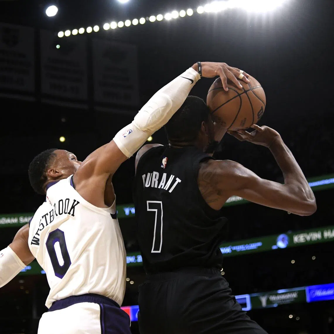 LA Lakers' Russell Westbrook blocking a layup by Brooklyn Nets' Kevin Durant in an NBA game on  Nov 13, 2022. Durant is headed for Phoenix Suns and Westbrook for Utah Jazz.