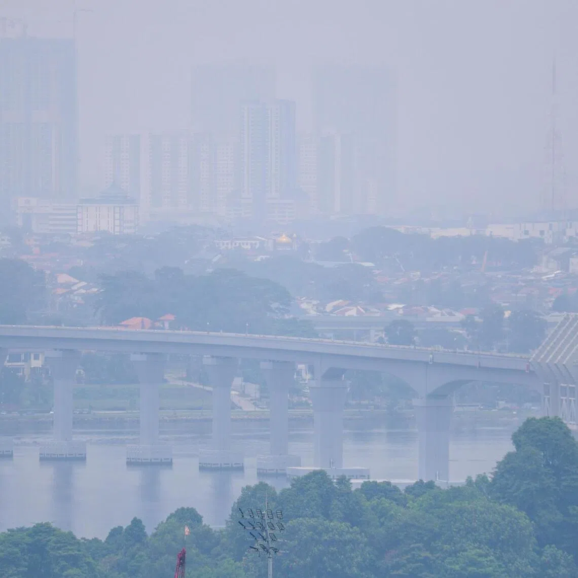 The RTS link bridge shrouded in haze, as seen from Urbanville@Woodlands at around 12.50pm on Oct 18.