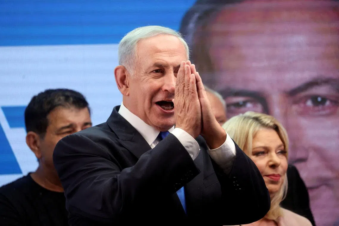 FILE PHOTO: Israeli Prime Minister-designate Benjamin Netanyahu gestures as he addresses his supporters at a campaign event in the run up to Israel's election in Or Yehuda, Israel October 30, 2022. 