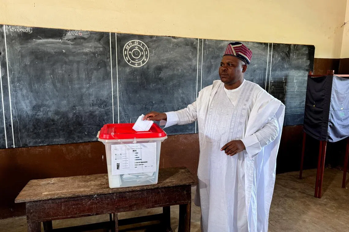 Presidential candidate Paul Hounkpe of FCBE (Force Cauris pour un Benin Emergent) votes during the presidential election, at a polling station in Bopa, Benin April 12, 2026. REUTERS/Stringer