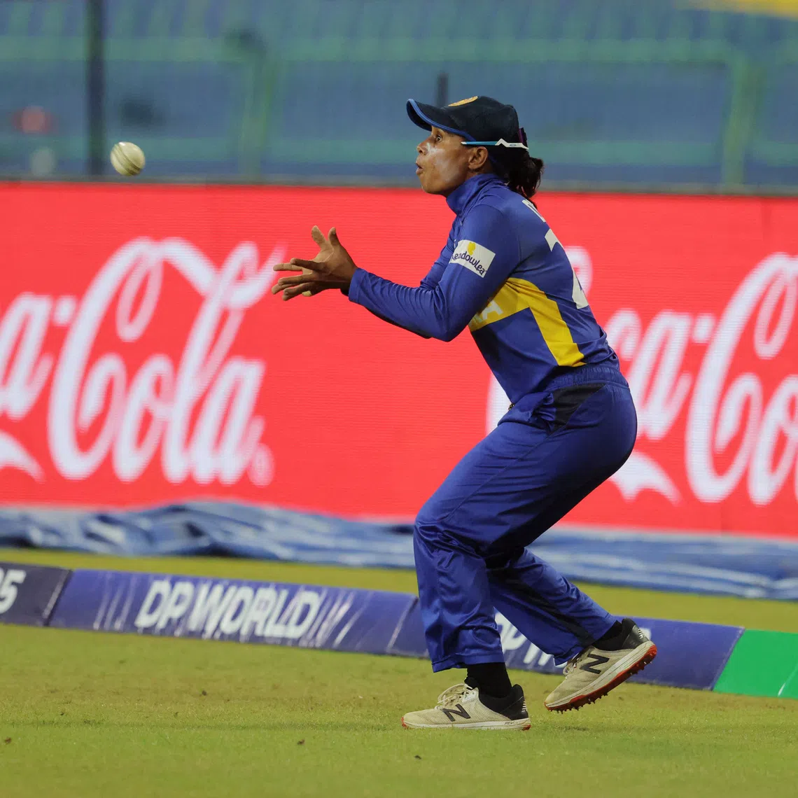 FILE PHOTO: Cricket - ICC Women's World Cup - Sri Lanka v England - R. Premadasa International Cricket Stadium, Colombo, Sri Lanka - October 11, 2025 Sri Lanka's Nilakshika Silva takes a catch to dismiss England's Nat Sciver-Brunt off the bowling of Sri Lanka's Udeshika Prabodhani REUTERS/Lahiru Harshana/File Photo