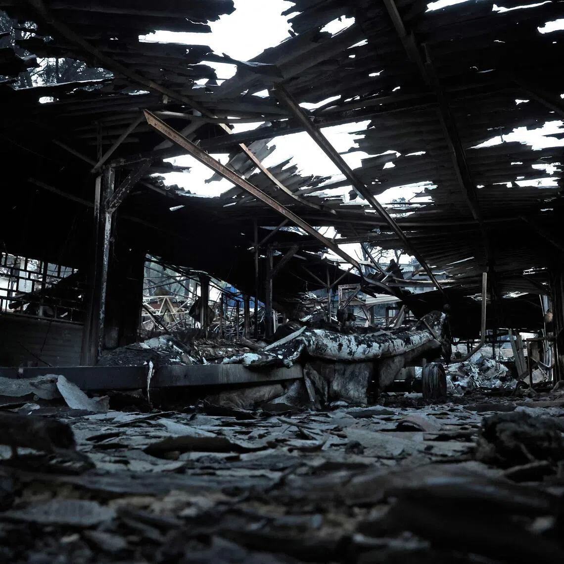 A view of the burned El Ancla jetty at the San Juan Reservoir after a wildfire in Pelayos de la Presa, Spain, on July 27.