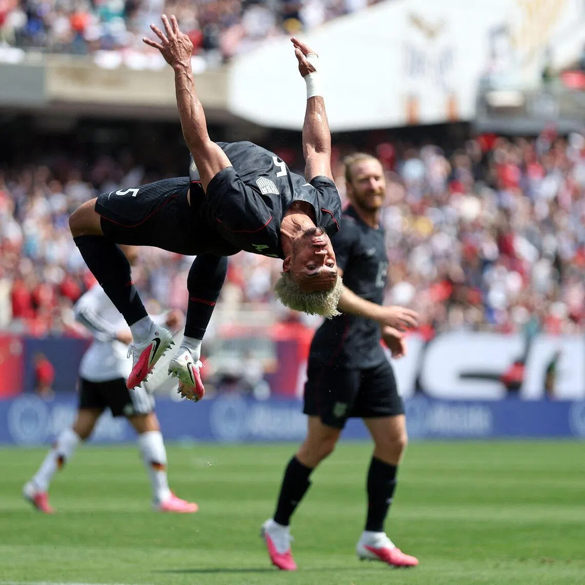 CHICAGO, ILLINOIS - JUNE 06: 


Antonee Robinson #5 of United States celebrates after scoring his team's first goal during the international friendly match between United States and Germany at Soldier Field on June 06, 2026 in Chicago, Illinois.   Jamie Squire/Getty Images/AFP (Photo by JAMIE SQUIRE / GETTY IMAGES NORTH AMERICA / Getty Images via AFP)
