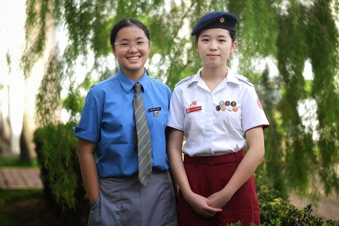 From left: profile photo of Cedar Girls' Secondary School students Elina Chua, 13 and Gracias Prasetyo, 16, on Feb 7, 2025. They performed CPR compression while applying AED on a cardiac arrest casualty on Feb 4.