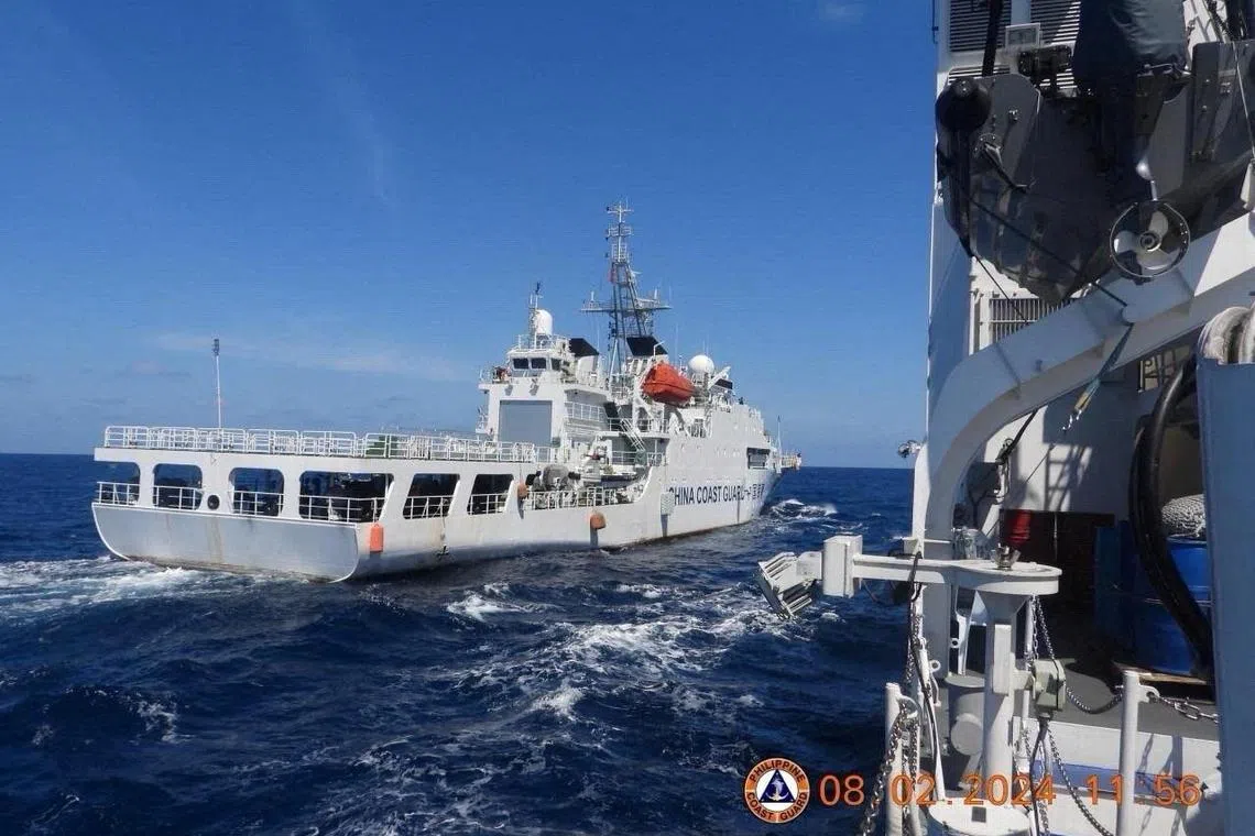 A China Coast Guard vessel manoeuvres near Philippine Coast Guard vessel BRP Teresa Magbanua near Scarborough Shoal in the South China Sea on Feb 8, 2024. The Philippines has accused Chinese coast guard ships of manoeuvring dangerously. Philippine Coast Guard via REUTERS