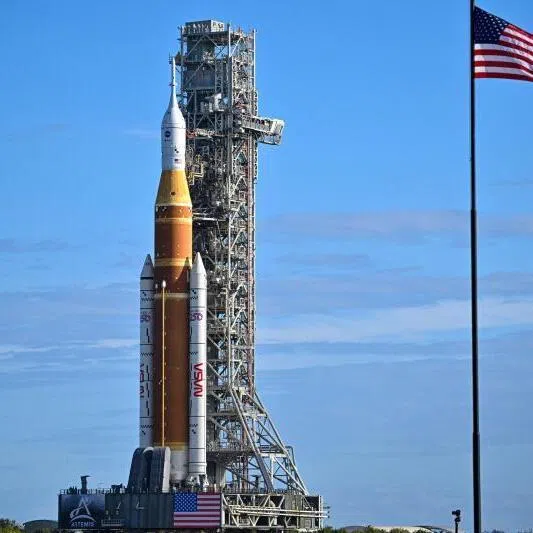NASA's Artemis 2 Space Launch System rocket and Orion spacecraft being rolled out of the Vehicle Assembly Building to Launch Pad 39B at Kennedy Space Center in Florida on Jan 17, 2026.