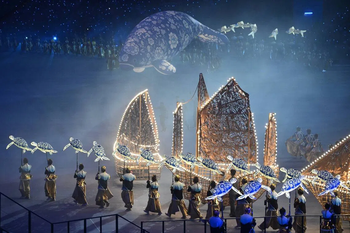 Performers from Soka Gakkai Singapore performing alongside marine animal puppets during Chapter 3 of National Day Parade 2026 at the National Stadium on Aug 9.