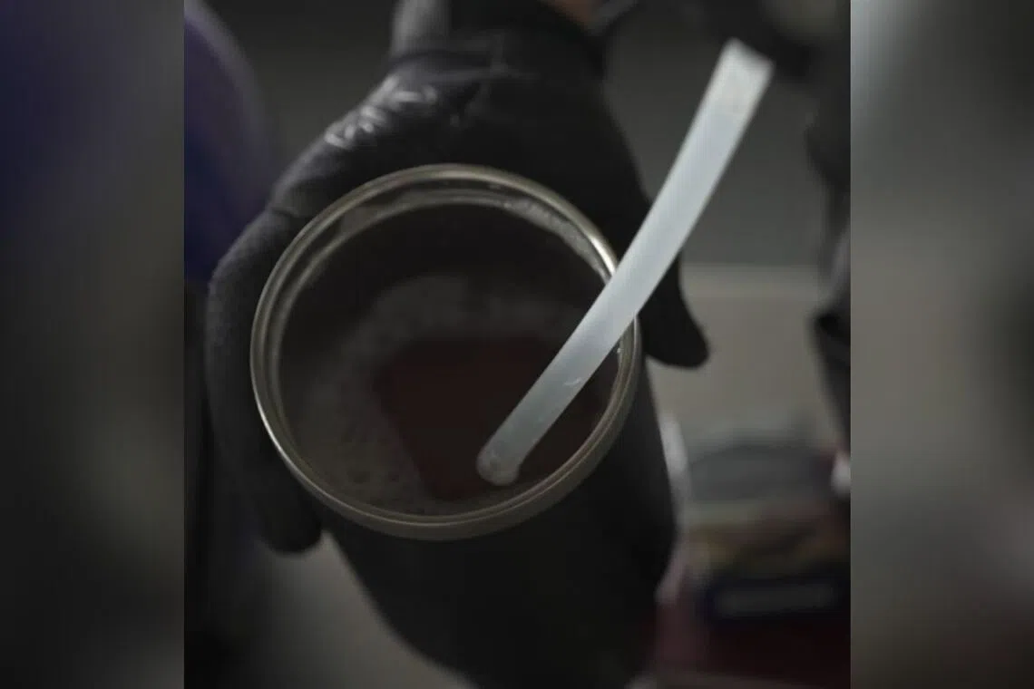 The officers uncovered a bottle containing liquid suspected to be "kratom" in the man's bag.