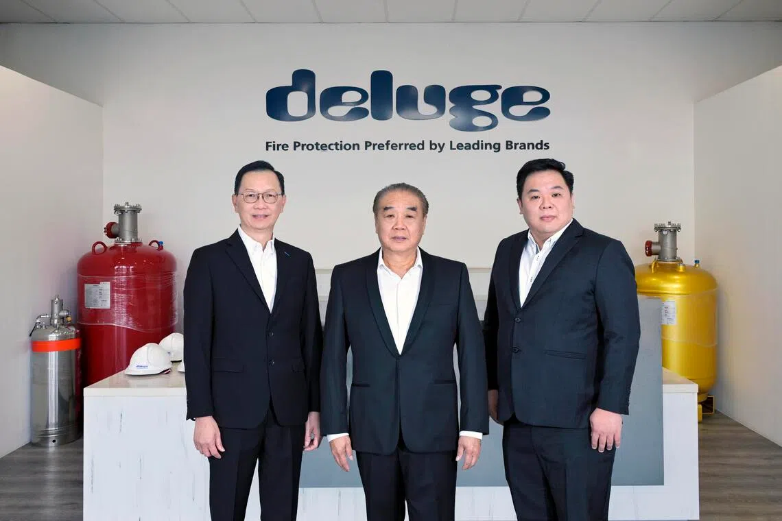 Deluge was previously in talks with Jardine Matheson to sell the business before opting for an SGX listing instead, said founder and chairman Vincent Cheo (centre), pictured with CEO Lee Wai Wah (left) and CFO Fredrik Tan.
