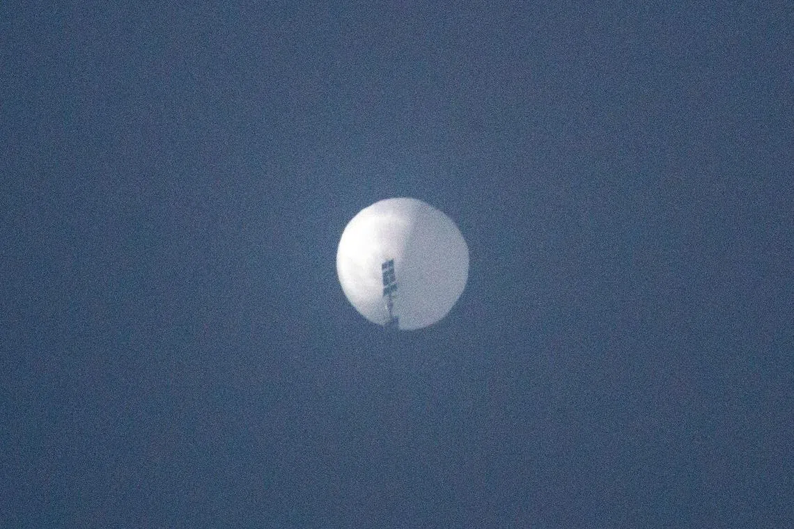 TOPSHOT - This handout photo from Chase Doak taken on February 1, 2023 and released on February 2 shows a suspected Chinese spy balloon in the sky over Billings, Montana. - The Pentagon said February 2 it was tracking a Chinese spy balloon flying high over the United States, reviving tensions between the two countries just days ahead of a rare visit to Beijing by the top US diplomat. (Photo by Chase DOAK / CHASE DOAK / AFP) / -----EDITORS NOTE --- RESTRICTED TO EDITORIAL USE - MANDATORY CREDIT "AFP PHOTO / CHASE DOAK " - NO MARKETING - NO ADVERTISING CAMPAIGNS - DISTRIBUTED AS A SERVICE TO CLIENTS