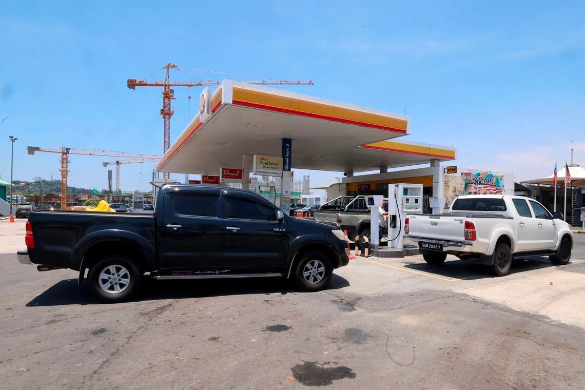 Trucks refuelling at a Shell station in Sabah on March 27.