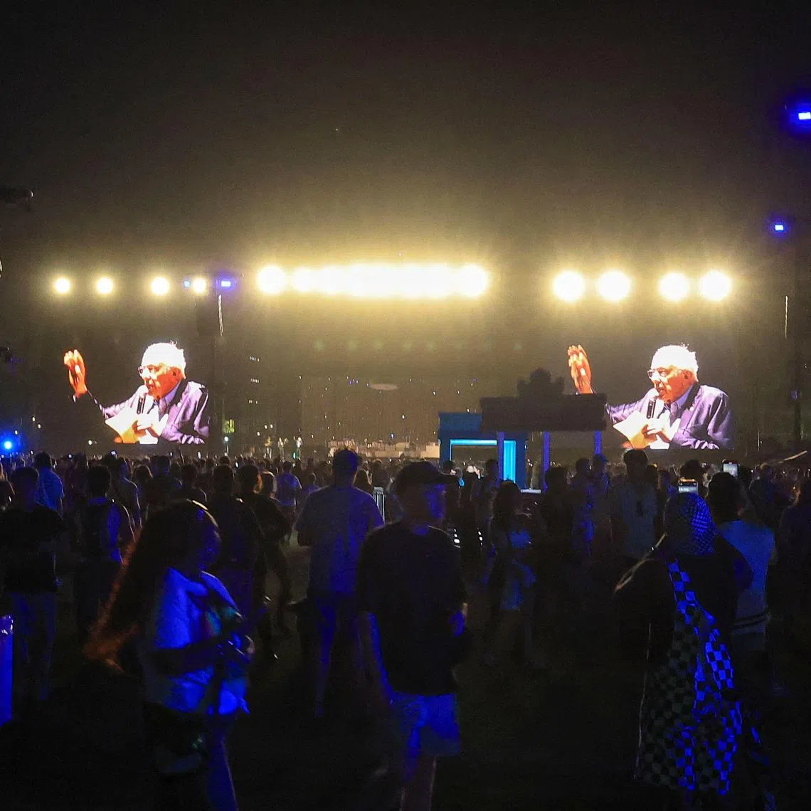 US Senator Bernie Sanders, Independent from Vermont, is seen on giant screens as he speaks on stage during the 2025 Coachella Valley Music and Arts Festival at Empire Polo Club on April 12.