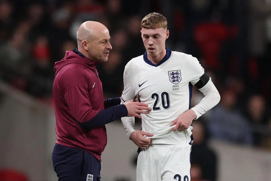 England interim manager Lee Carsley giving instructions to Cole Palmer during the Nations League match against Greece.
