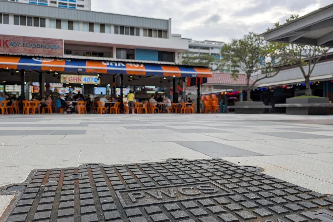 wywaste03 - A manhole cover for the pneumatic waste conveyance system in Teck Ghee on Jan 20, 2025.
ST PHOTO: WONG YANG