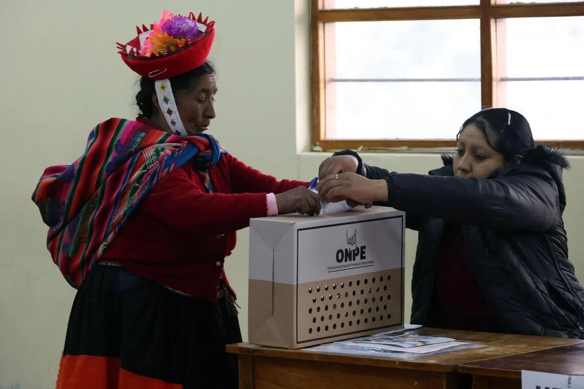 Polls open in tight Peru presidential runoff