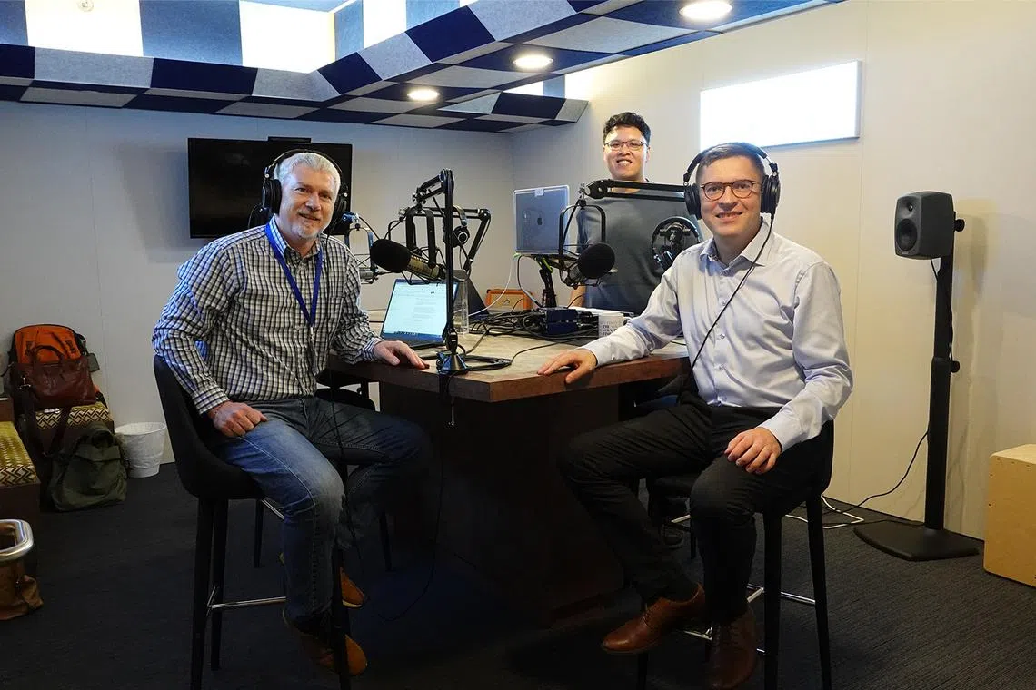 (From left) David Fogarty, ST's climate change editor, Hadyu Rahim (back), podcast producer and Mr Sami Jauhiainen, regional VP at Neste in ST Podcast Studio. 