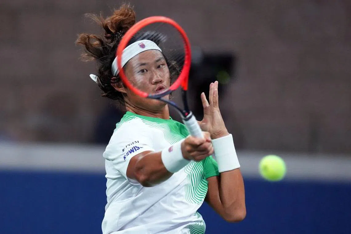 Aug 30, 2023; Flushing, NY, USA; Zhizhen Zhang of China hits to Casper Ruud of Norway on day three of the 2023 U.S. Open tennis tournament at USTA Billie Jean King National Tennis Center. Mandatory Credit: Danielle Parhizkaran-USA TODAY Sports