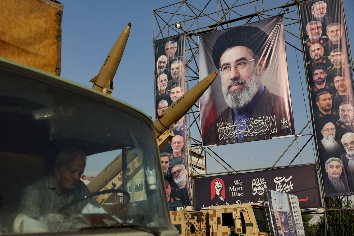 Iranian missiles are displayed next to a banner with a picture of Iran's Supreme Leader, Mojtaba Khamenei, on a street in Tehran, Iran, September 27, 2026. Majid Asgaripour/WANA (West Asia News Agency) via REUTERS ATTENTION EDITORS - THIS PICTURE WAS PROVIDED BY A THIRD PARTY. ISRAEL OUT. NO COMMERCIAL OR EDITORIAL SALES IN ISRAEL. NO ACCESS FOR ISRAELI MEDIA. NO USE BBC PERSIAN. NO USE VOA PERSIAN. NO USE MANOTO. NO USE IRAN INTERNATIONAL. NO USE RADIO FARDA. DIGITAL: NO USE BBC PERSIAN. NO USE VOA PERSIAN. NO USE MANOTO. NO USE IRAN INTERNATIONAL. NO USE RADIO FARDA. TPX IMAGES OF THE DAY