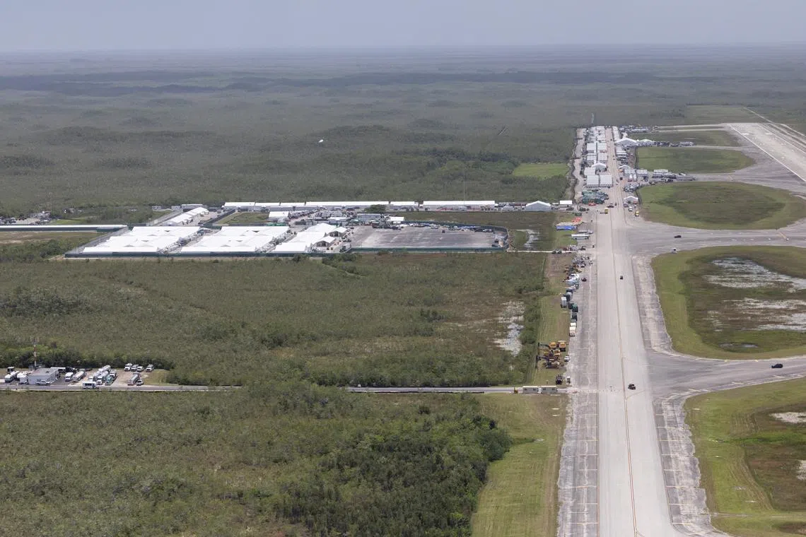 FILE PHOTO: An aerial view shows \"Alligator Alcatraz\" ICE detention center at Dade-Collier Training and Transition Airport in Ochopee, Florida, U.S. July 24, 2025. REUTERS/Marco Bello/File Photo